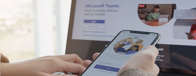 Mobile and laptop logged into Microsoft 365